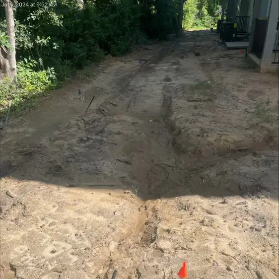 Catch basin installation for yard drainage system