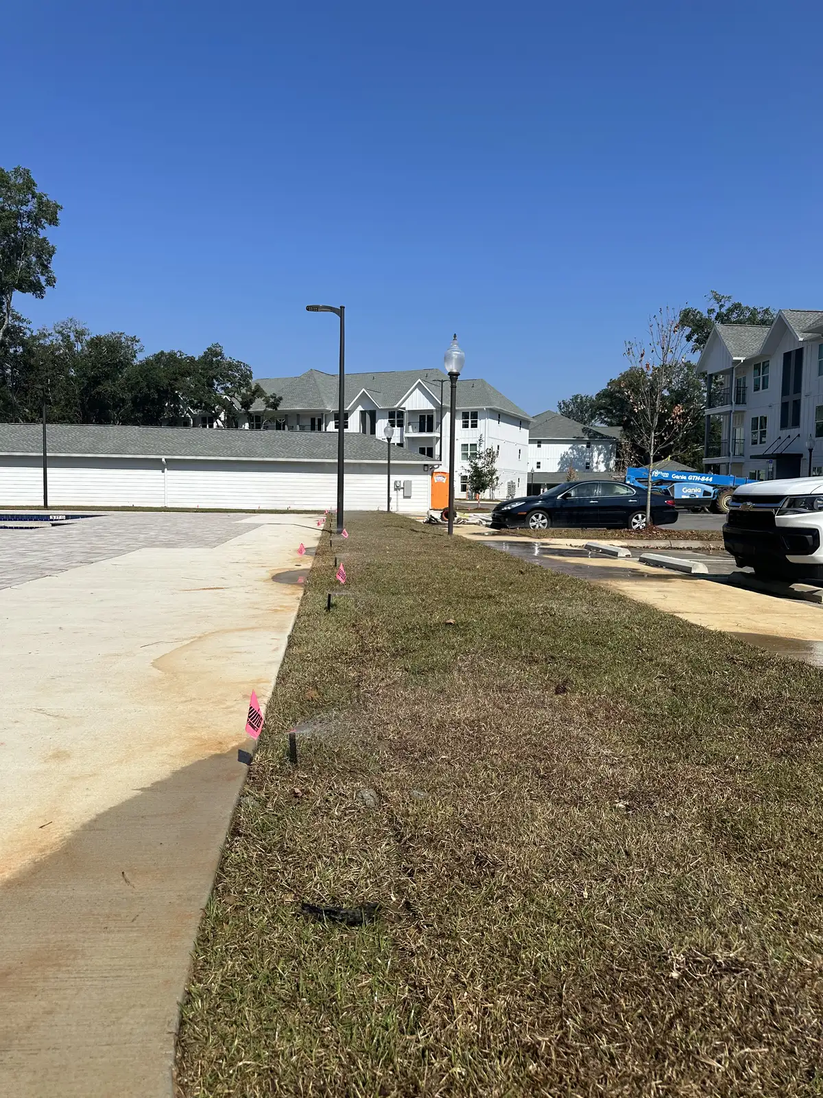 Pop-up sprinkler heads covering a turf area