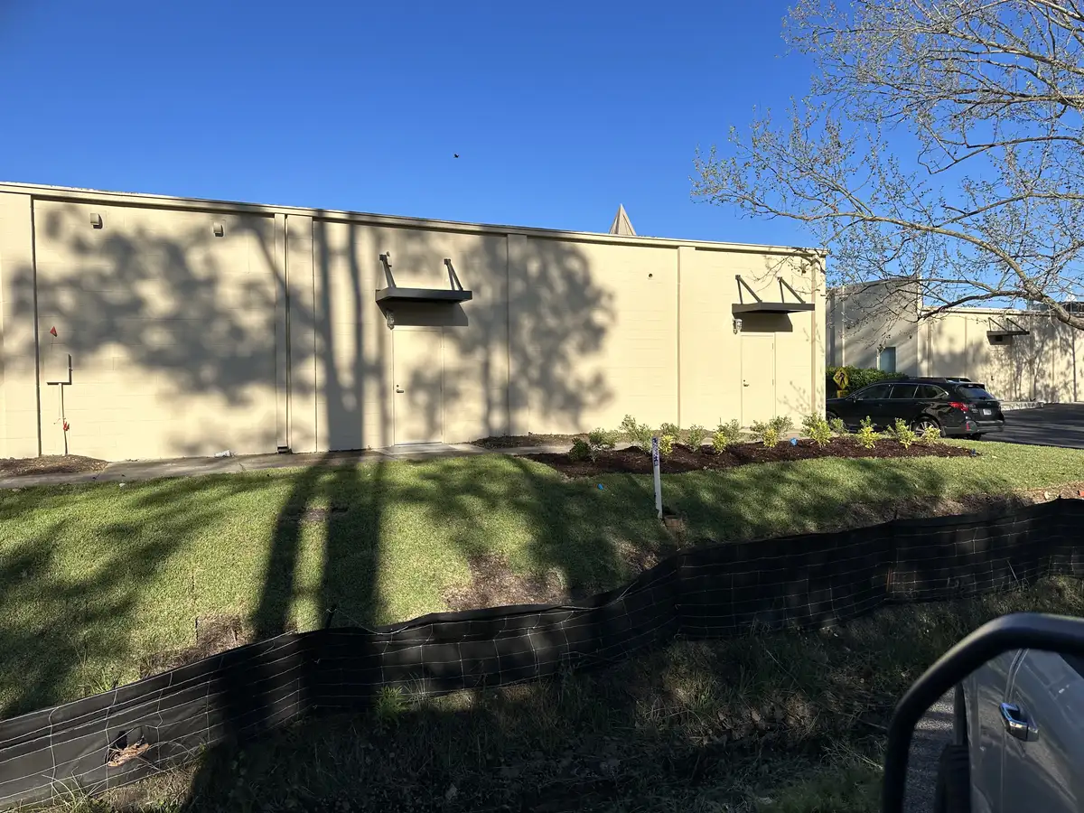 Fresh landscaping with mulch beds and plantings