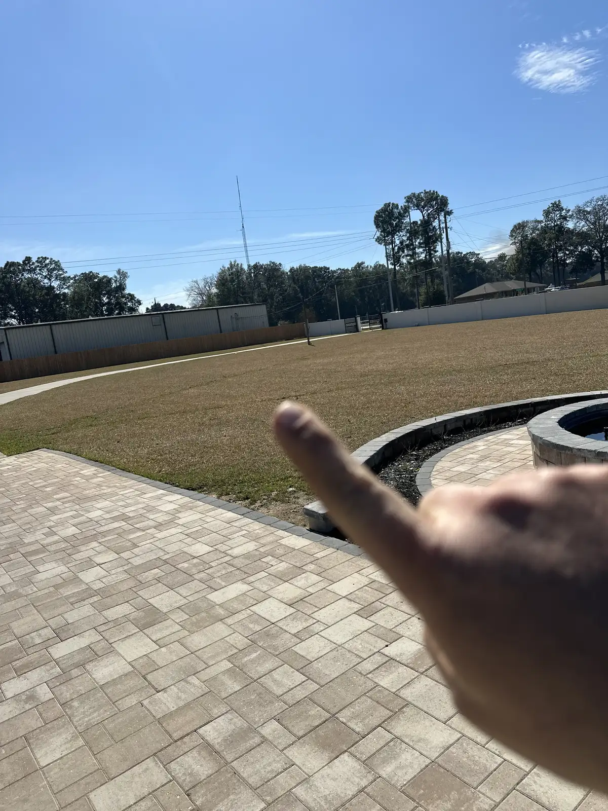 Outdoor living installation with landscape lighting