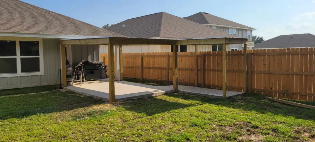 Outdoor living area with landscape lighting