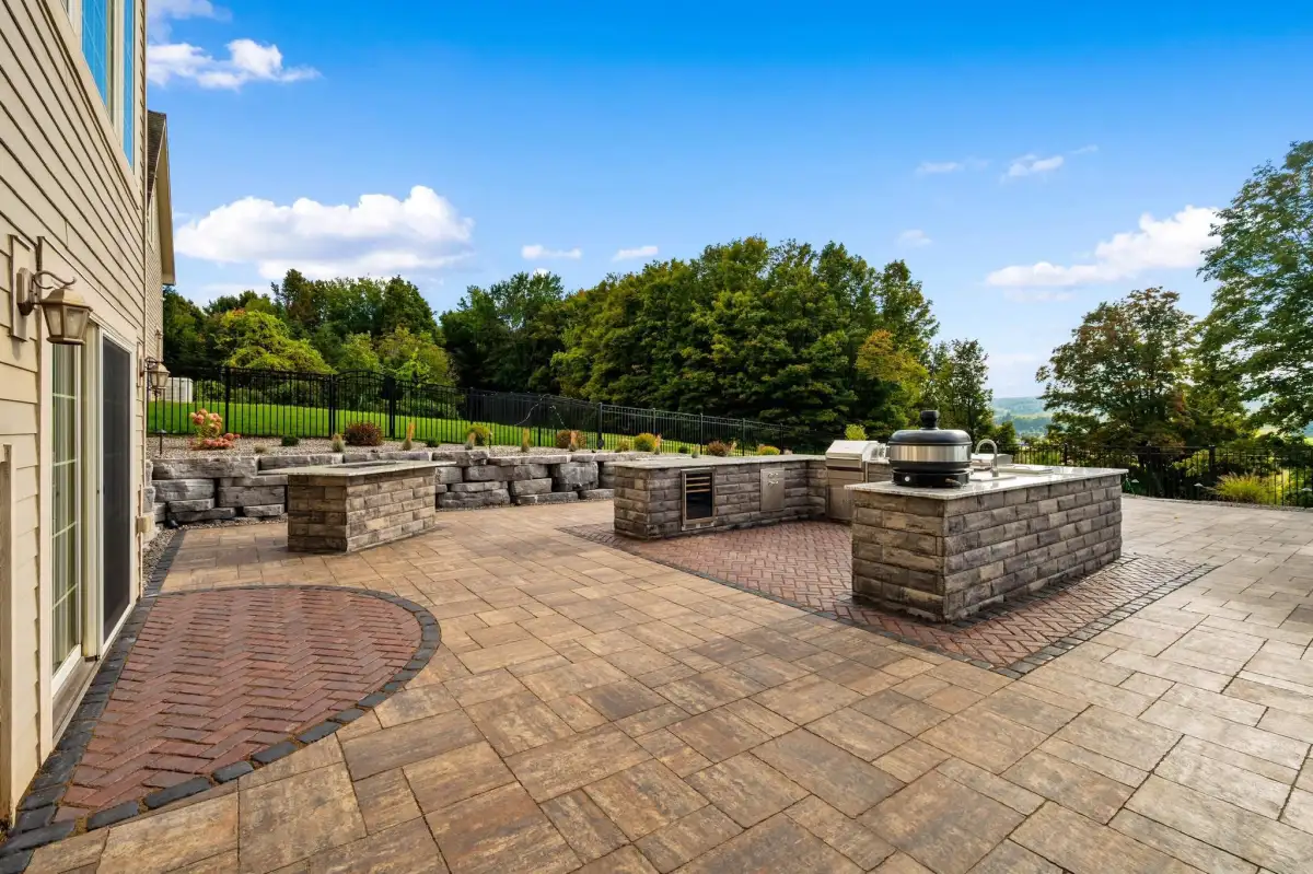 Custom paver patio and outdoor living space by Way's Lawn and Landscape in Pensacola FL