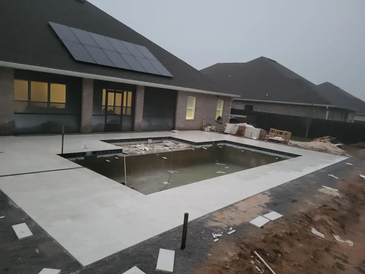 Travertine paver patio with border detail in Destin FL