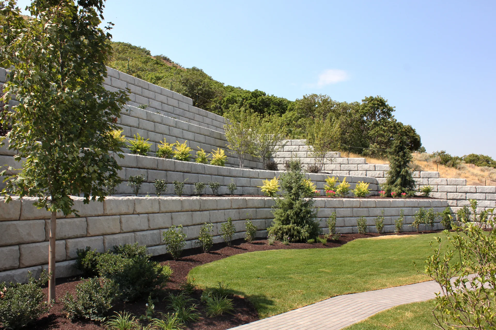 Tiered residential retaining wall with landscaping