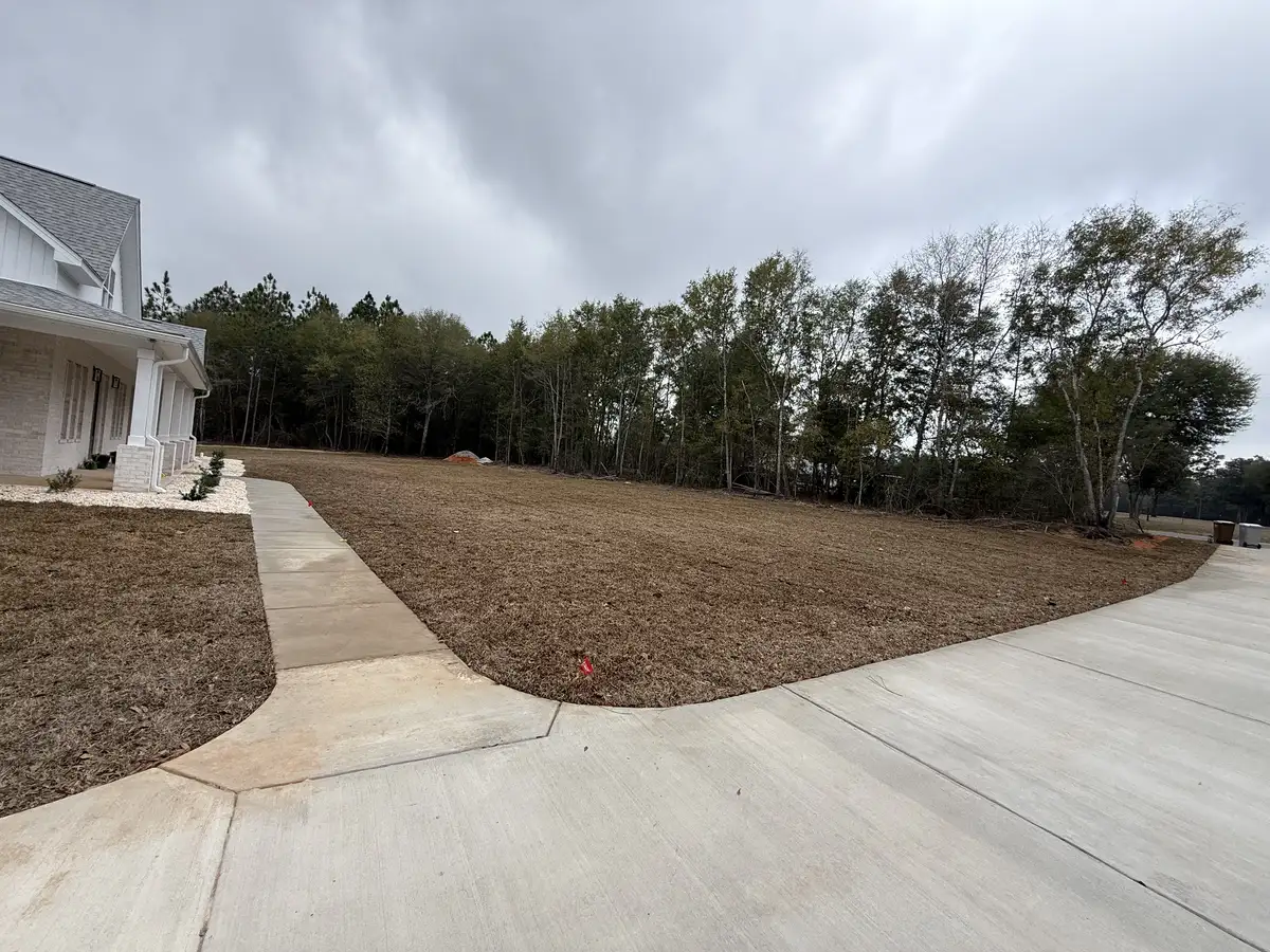 Newly installed sod lawn with irrigation watering